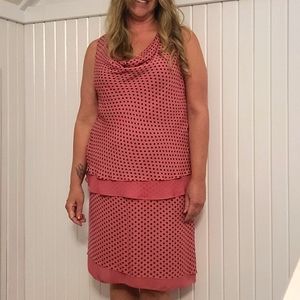 Emma pink and black matching cowel neck top and skirt.